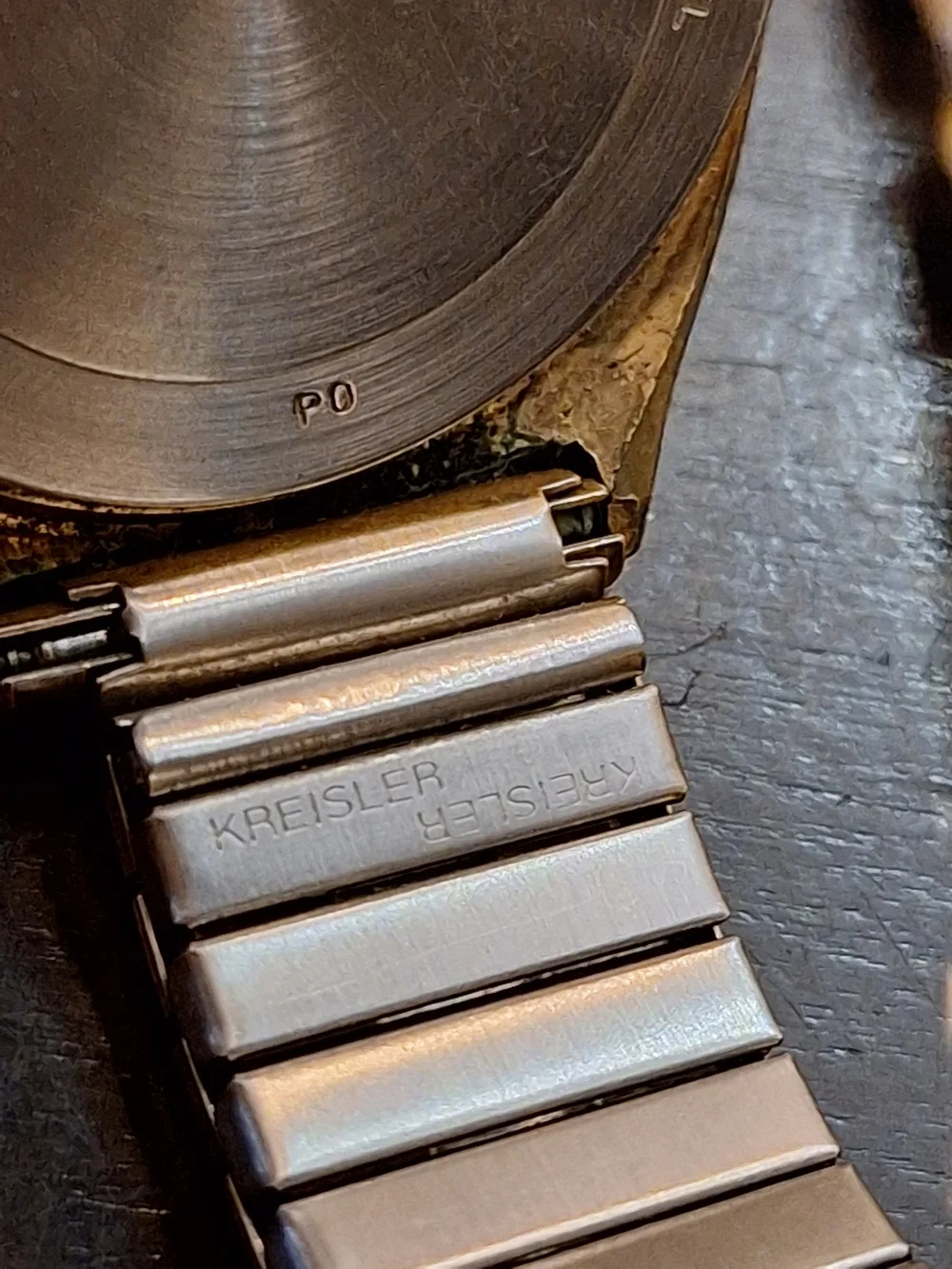 Bulova Gold and White Dress Watch with Roman Numerals‎